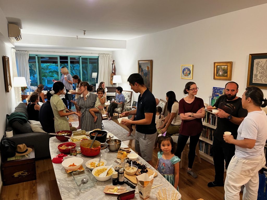 Church members enjoying a pot luck supper